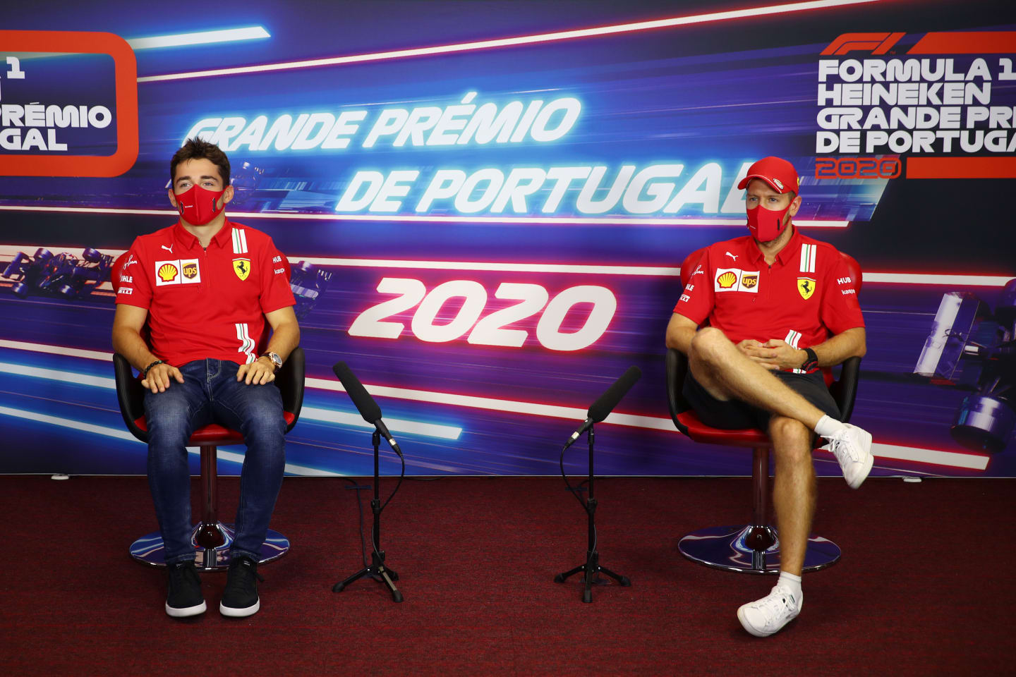 PORTIMAO, PORTUGAL - OCTOBER 22: Charles Leclerc of Monaco and Ferrari and Sebastian Vettel of