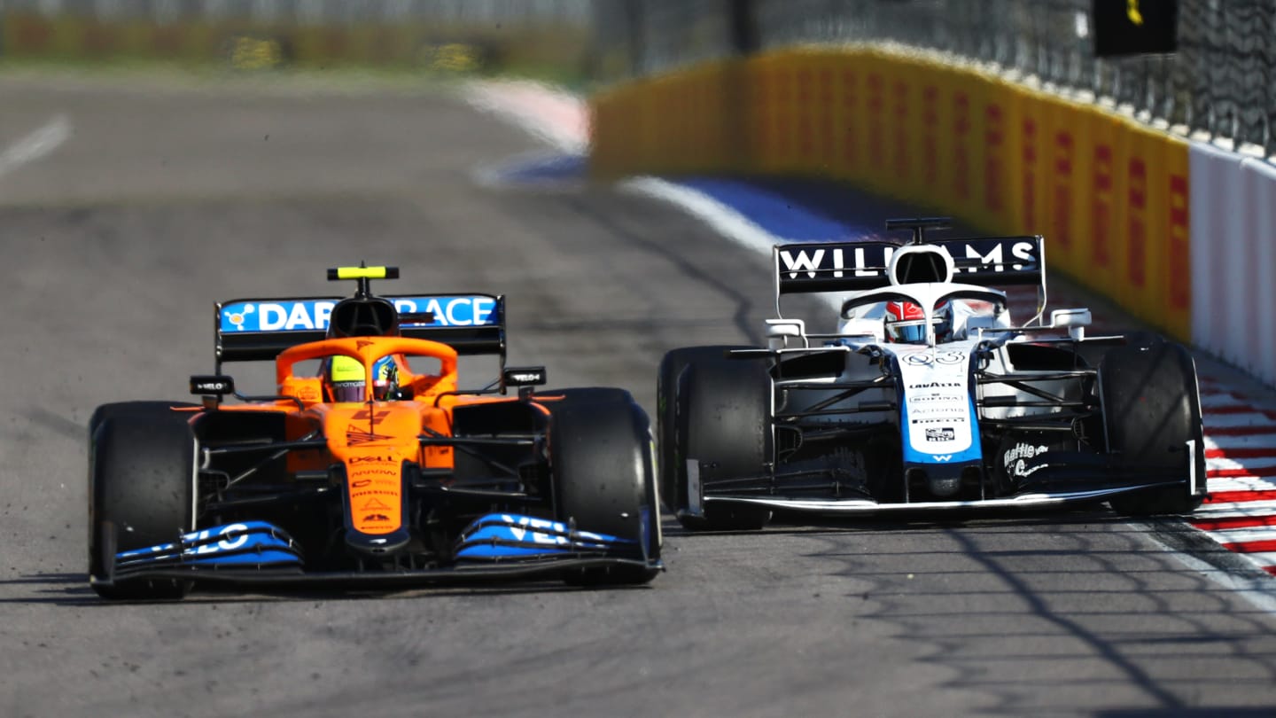 SOCHI, RUSSIA - SEPTEMBER 27: Lando Norris of Great Britain driving the (4) McLaren F1 Team MCL35 Renault leads George Russell of Great Britain driving the (63) Williams Racing FW43 Mercedes during the F1 Grand Prix of Russia at Sochi Autodrom on September 27, 2020 in Sochi, Russia. (Photo by Dan Istitene - Formula 1/Formula 1 via Getty Images)