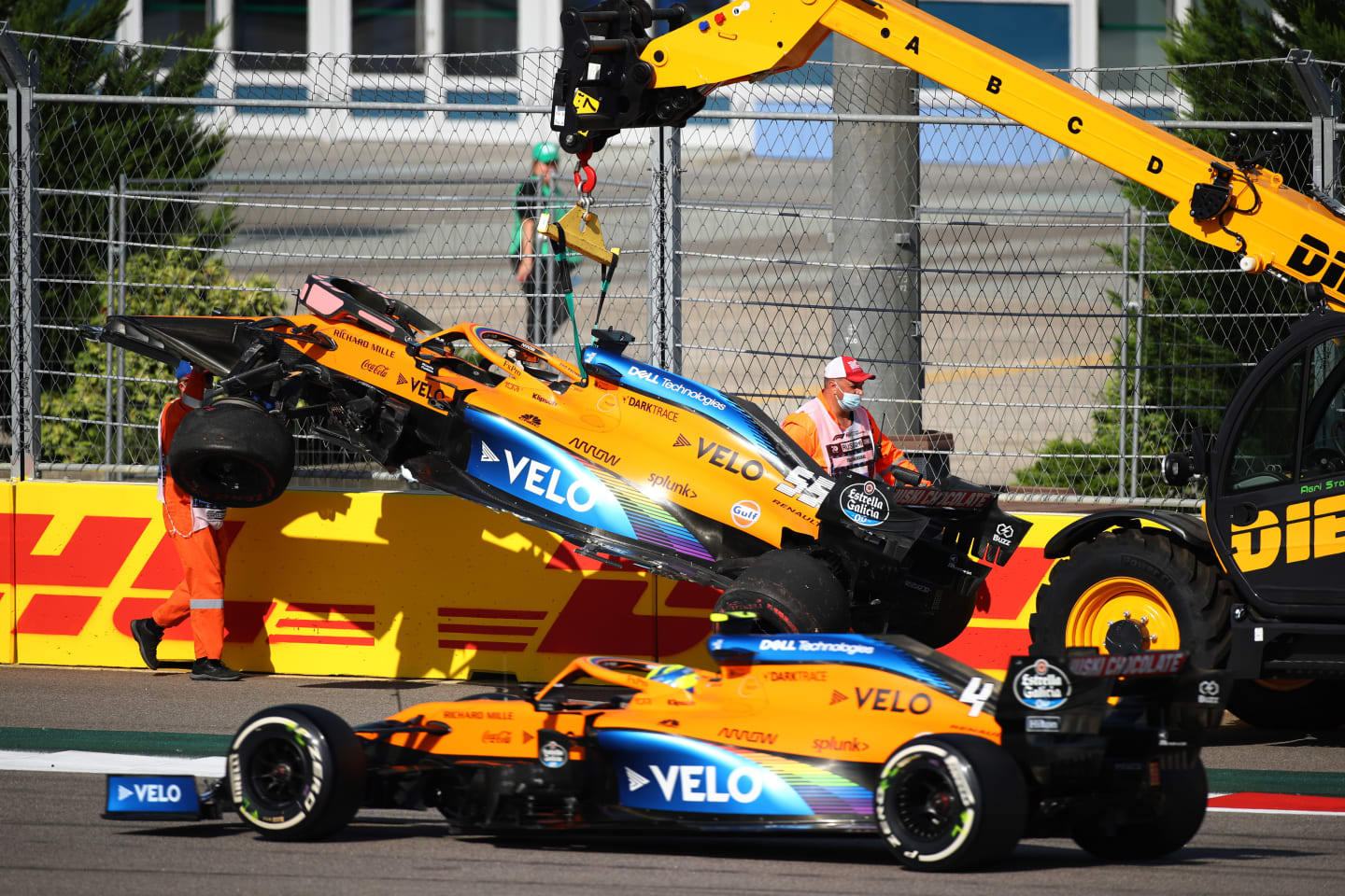 SOCHI, RUSSIA - SEPTEMBER 27: The car of Carlos Sainz of Spain and McLaren F1 is removed from the track after crashing on the first lap during the F1 Grand Prix of Russia at Sochi Autodrom on September 27, 2020 in Sochi, Russia. (Photo by Bryn Lennon/Getty Images)