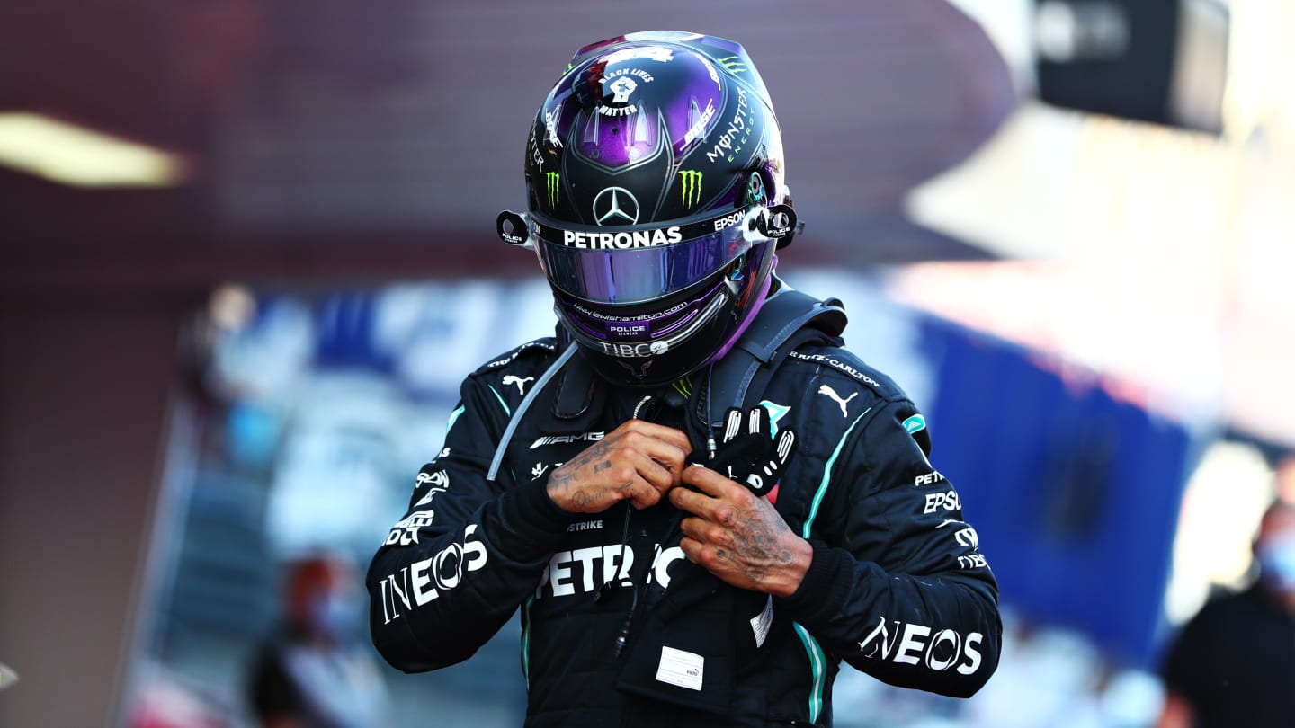 SOCHI, RUSSIA - SEPTEMBER 27: Third placed Lewis Hamilton of Great Britain and Mercedes GP walks in