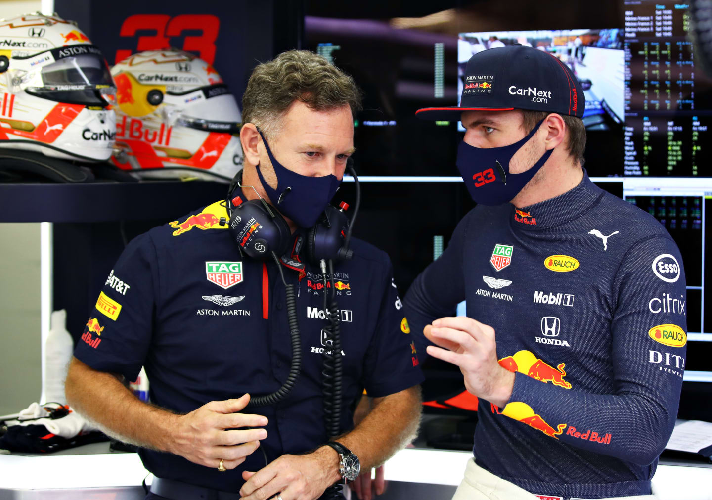 BAHRAIN, BAHRAIN - DECEMBER 05: Red Bull Racing Team Principal Christian Horner speaks with Max Verstappen of Netherlands and Red Bull Racing in the garage before qualifying ahead of the F1 Grand Prix of Sakhir at Bahrain International Circuit on December 05, 2020 in Bahrain, Bahrain. (Photo by Mark Thompson/Getty Images)