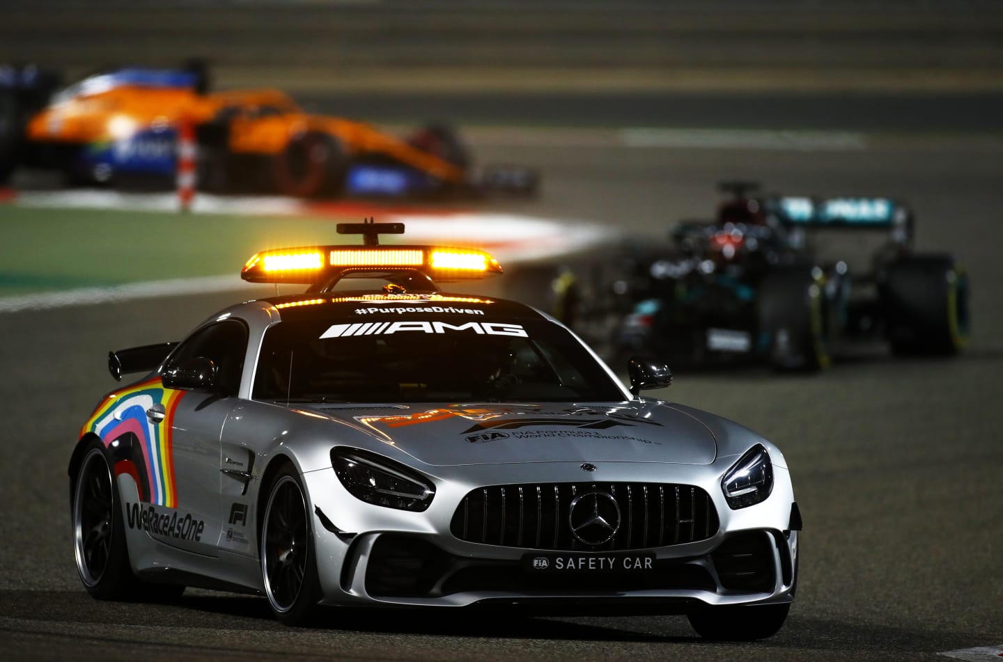BAHRAIN, BAHRAIN - DECEMBER 06: The FIA Safety Car leads the field during the F1 Grand Prix of