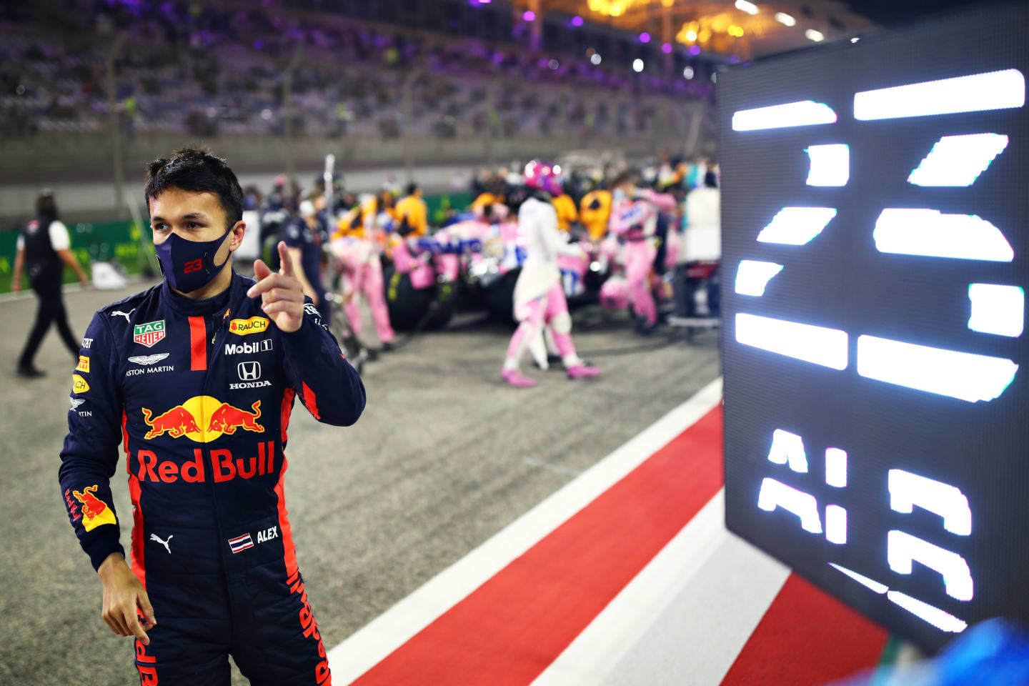 BAHRAIN, BAHRAIN - DECEMBER 06: Alexander Albon of Thailand and Red Bull Racing prepares to drive on the grid before the F1 Grand Prix of Sakhir at Bahrain International Circuit on December 06, 2020 in Bahrain, Bahrain. (Photo by Mark Thompson/Getty Images)