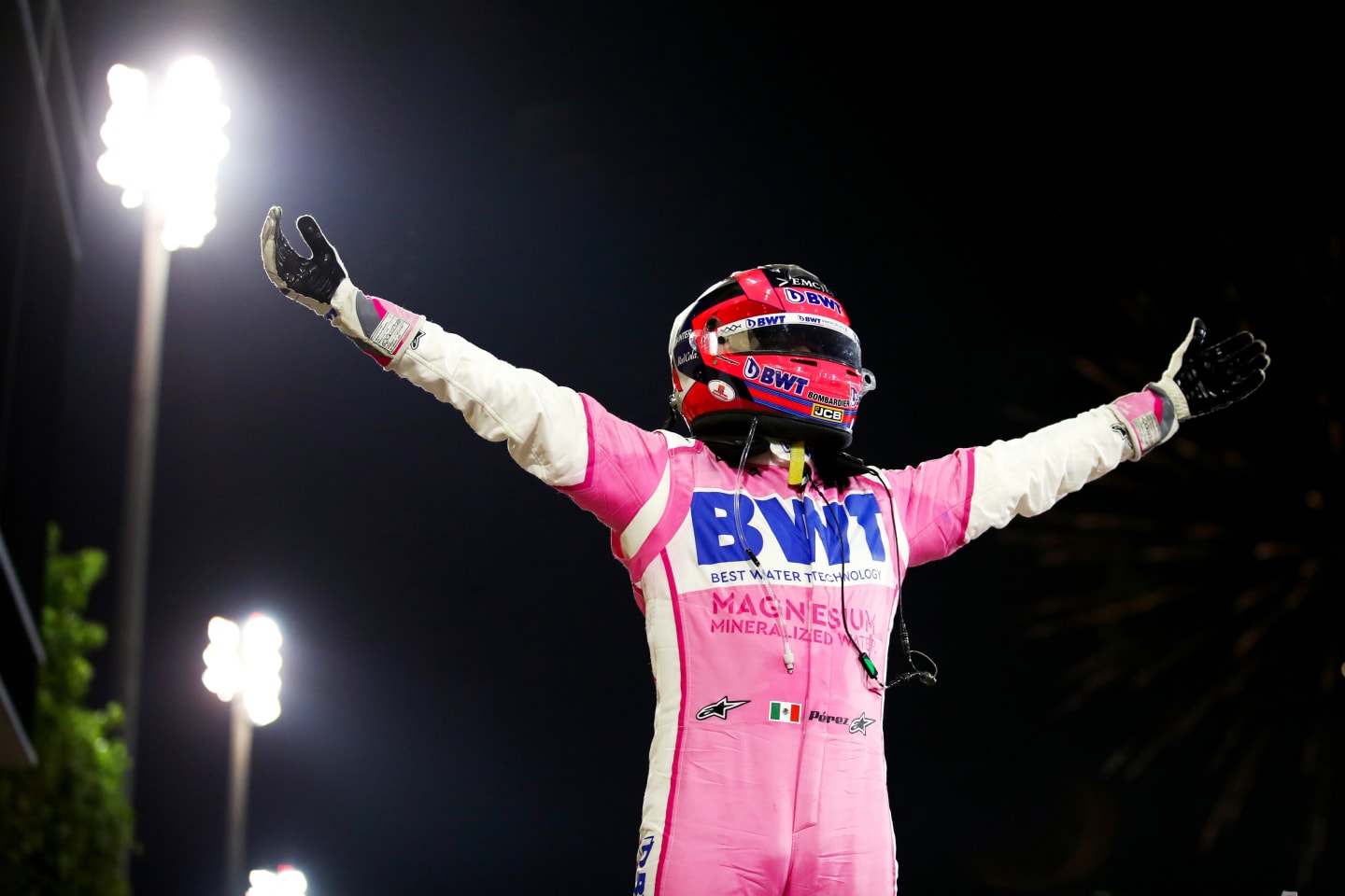 BAHRAIN, BAHRAIN - DECEMBER 06: Race winner Sergio Perez of Mexico and Racing Point celebrates in parc ferme during the F1 Grand Prix of Sakhir at Bahrain International Circuit on December 06, 2020 in Bahrain, Bahrain. (Photo by Bryn Lennon/Getty Images)