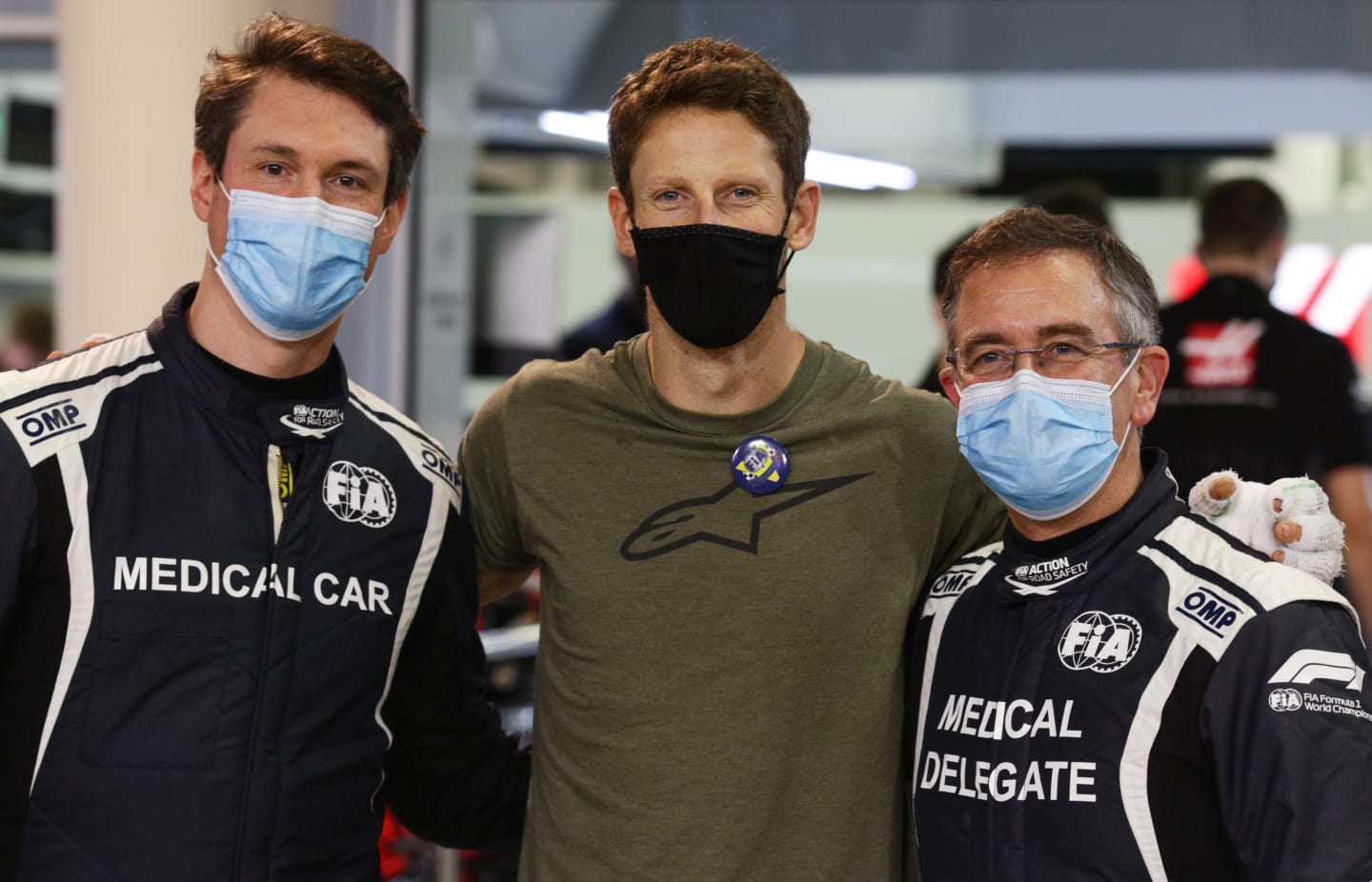 BAHRAIN, BAHRAIN - DECEMBER 03: Romain Grosjean of France and Haas F1 poses for a photo with FIA