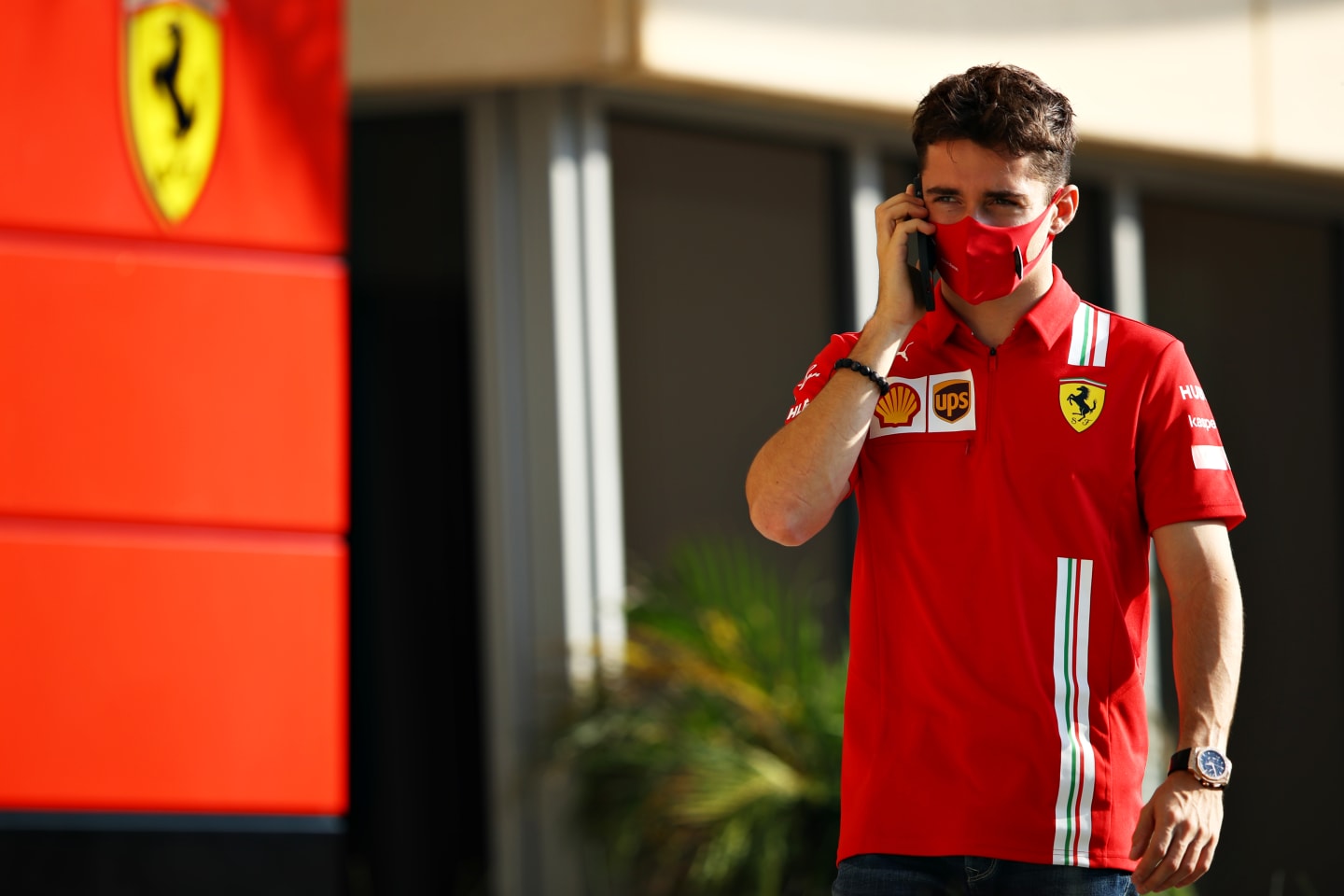 BAHRAIN, BAHRAIN - DECEMBER 03: Charles Leclerc of Monaco and Ferrari walks in the paddock on the