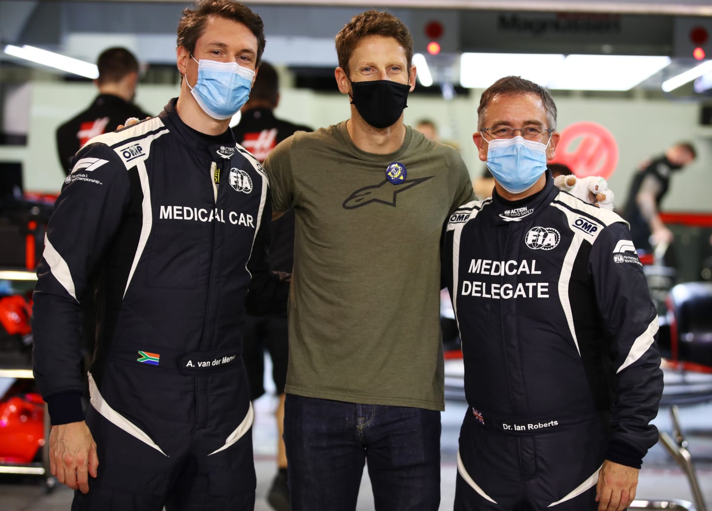 BAHRAIN, BAHRAIN - DECEMBER 03: Romain Grosjean of France and Haas F1 poses for a photo with FIA