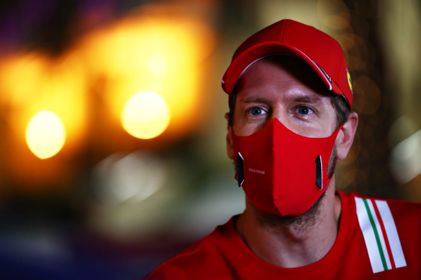 BAHRAIN, BAHRAIN - DECEMBER 03: Sebastian Vettel of Germany and Ferrari talks to the media in the
