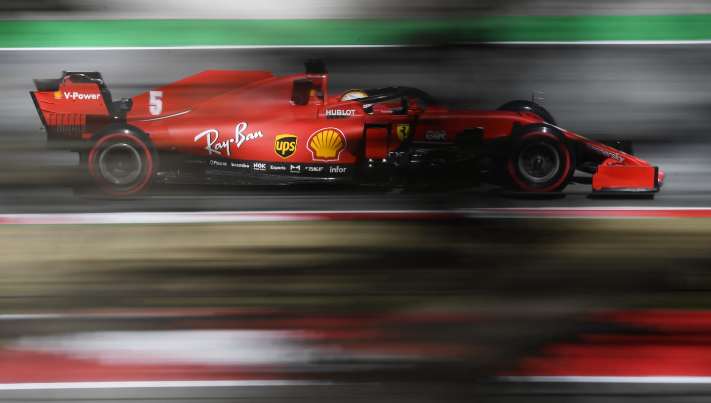 BARCELONA, SPAIN - AUGUST 14: Sebastian Vettel of Germany driving the (5) Scuderia Ferrari SF1000