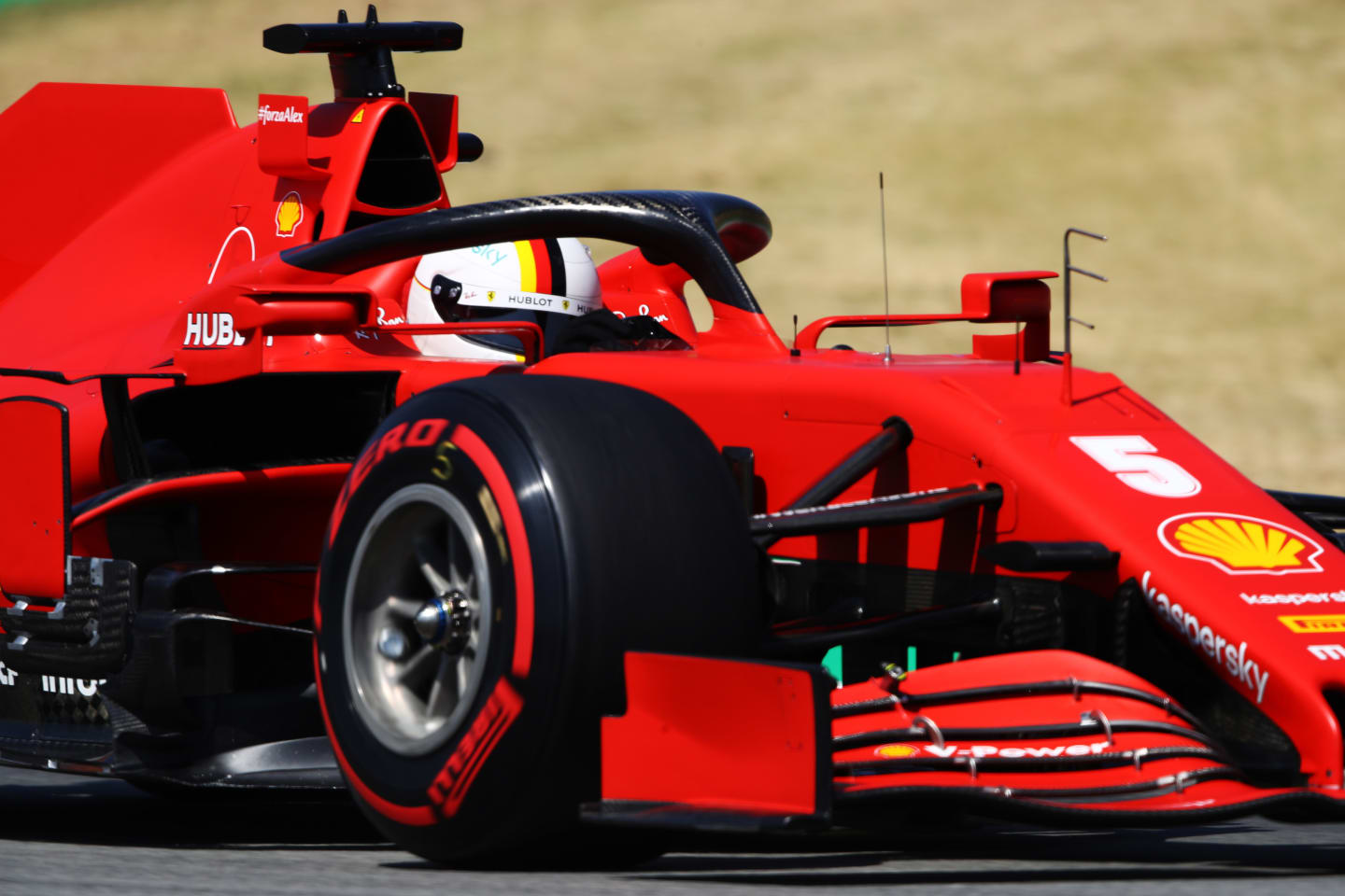 BARCELONA, SPAIN - AUGUST 15: Sebastian Vettel of Germany driving the (5) Scuderia Ferrari SF1000