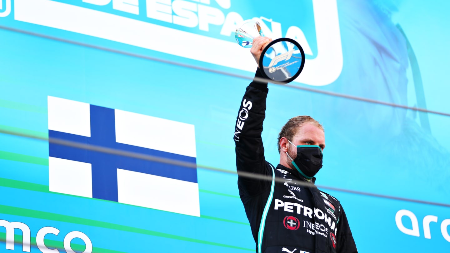 BARCELONA, SPAIN - AUGUST 16: Third placed Valtteri Bottas of Finland and Mercedes GP celebrates on the podium during the F1 Grand Prix of Spain at Circuit de Barcelona-Catalunya on August 16, 2020 in Barcelona, Spain. (Photo by Dan Istitene - Formula 1/Formula 1 via Getty Images)