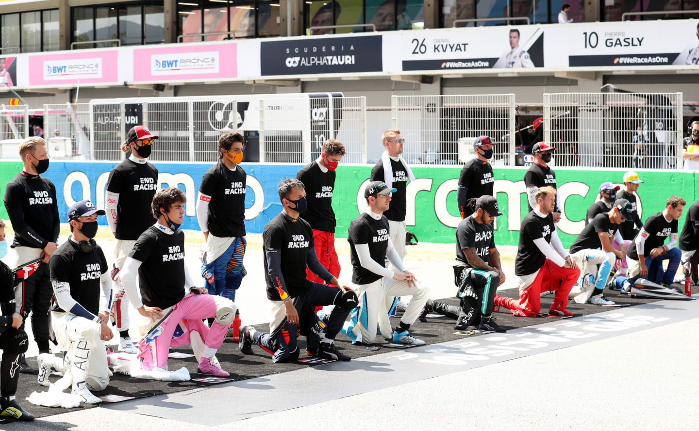 BARCELONA, SPAIN - AUGUST 16: The F1 drivers take a knee on the grid in support of the Black Lives