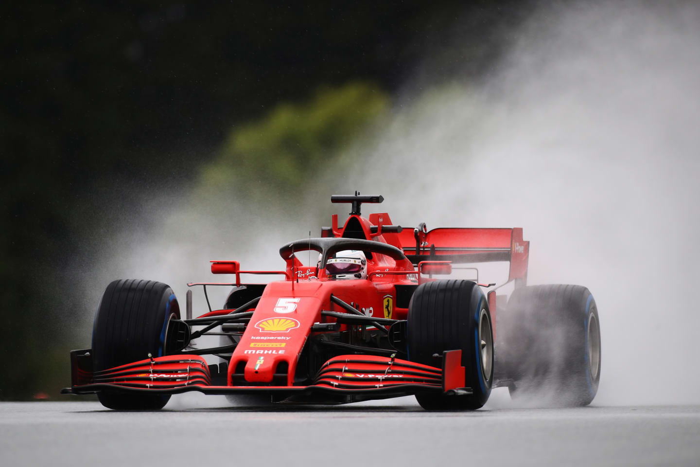 SPIELBERG, AUSTRIA - JULY 11: Sebastian Vettel of Germany driving the (5) Scuderia Ferrari SF1000