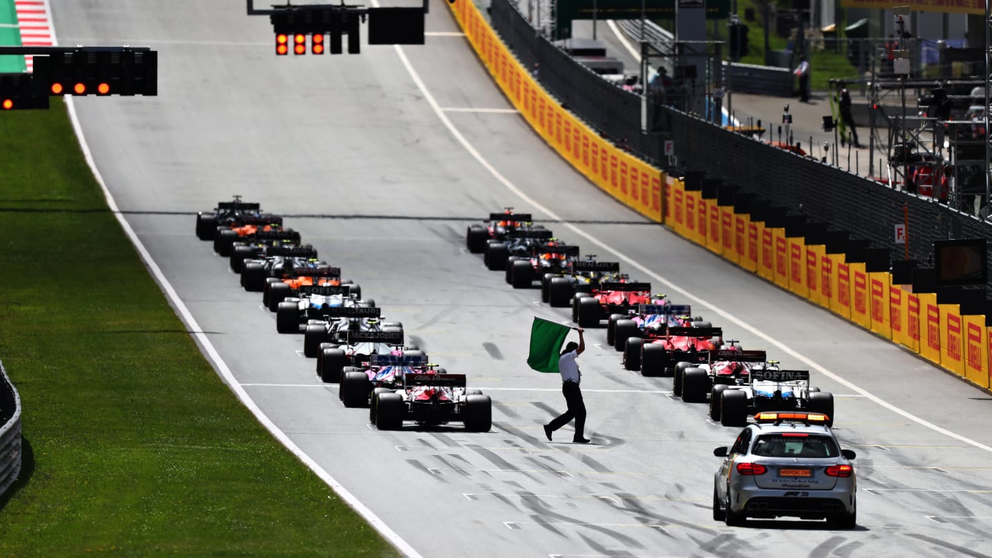 SPIELBERG, AUSTRIA - JULY 12: The cars line up on the grid before the Formula One Grand Prix of