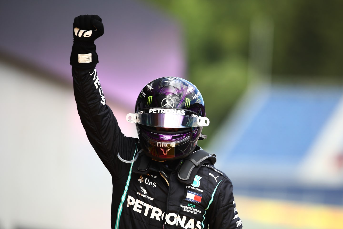 SPIELBERG, AUSTRIA - JULY 12: Lewis Hamilton of Great Britain and Mercedes GP celebrates in parc