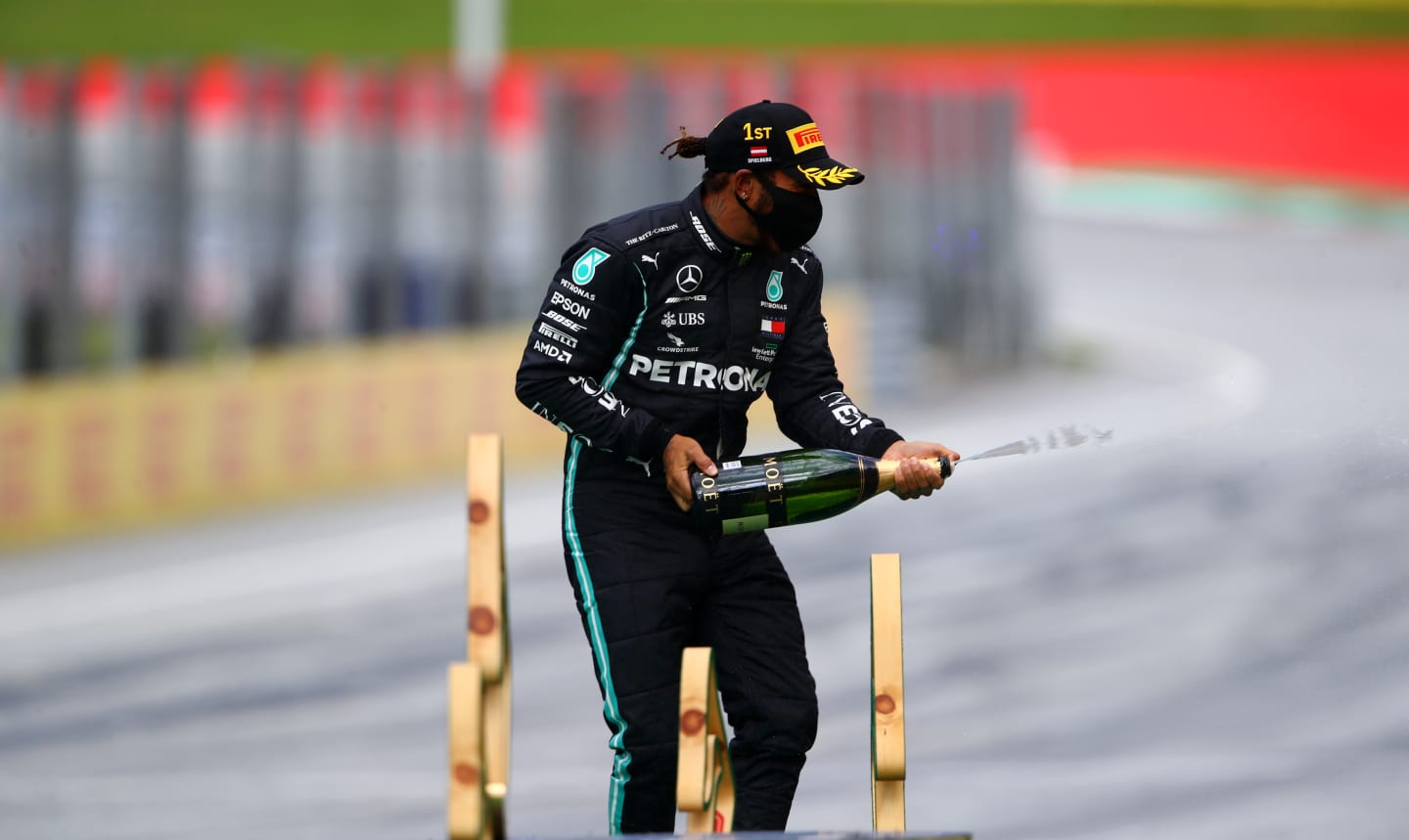 SPIELBERG, AUSTRIA - JULY 12: Lewis Hamilton of Great Britain and Mercedes GP celebrates on the