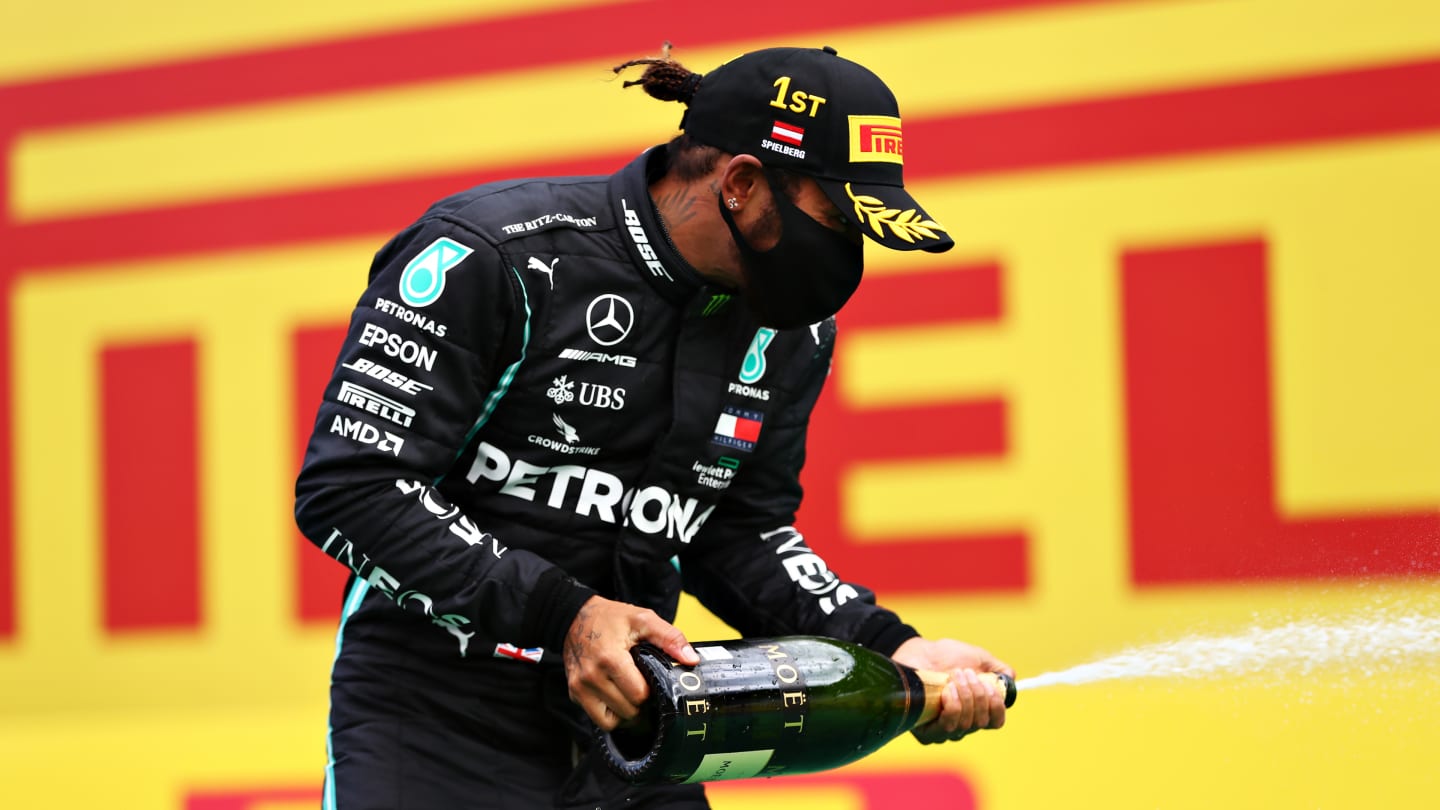 SPIELBERG, AUSTRIA - JULY 12: Lewis Hamilton of Great Britain and Mercedes GP celebrates on the