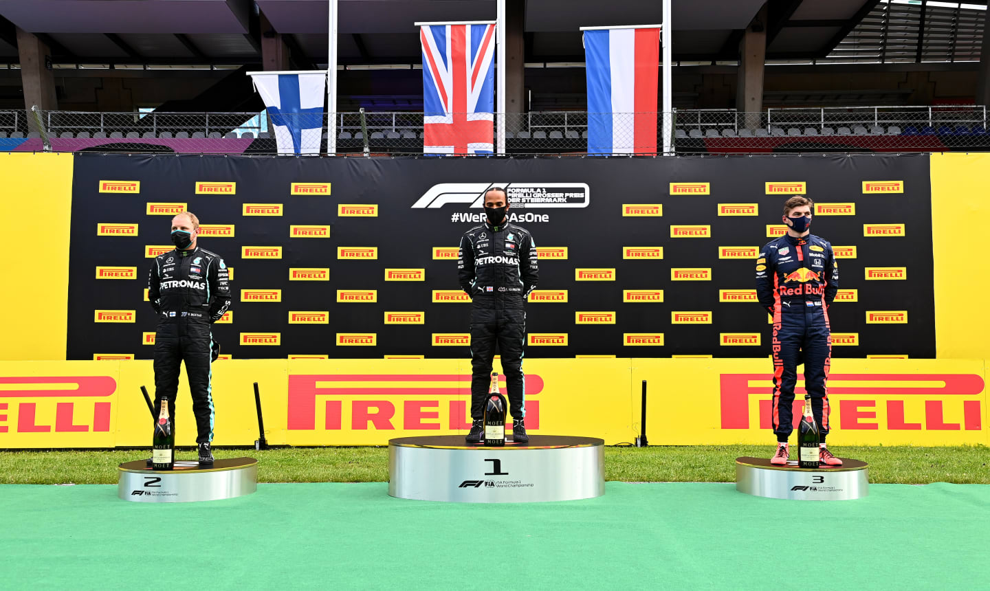 SPIELBERG, AUSTRIA - JULY 12: Race winner Lewis Hamilton of Great Britain and Mercedes GP (C),