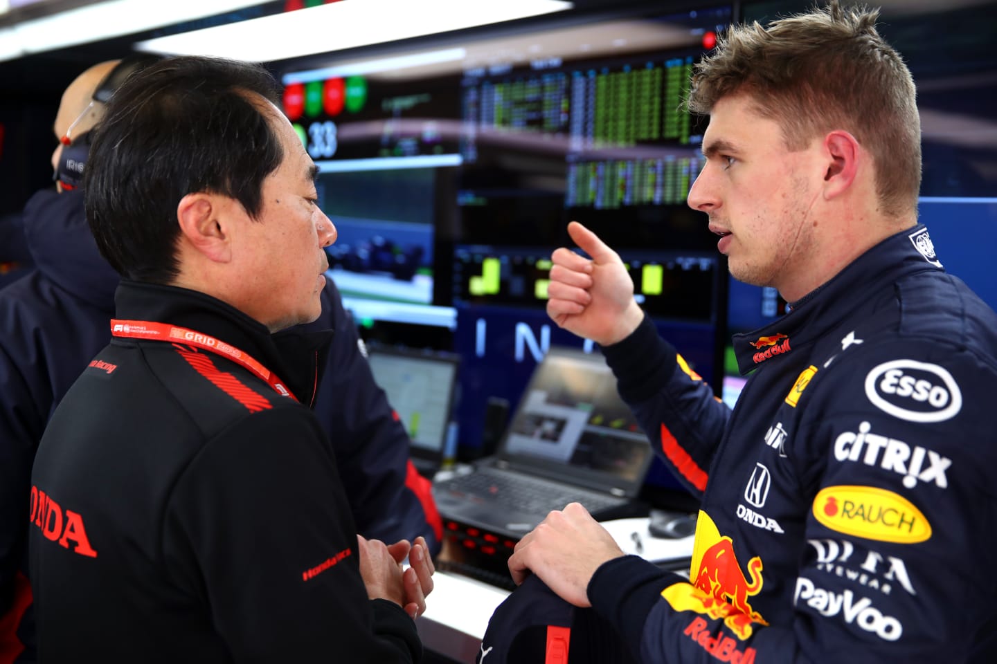 BARCELONA, SPAIN - FEBRUARY 19: Max Verstappen of Netherlands and Red Bull Racing talks with