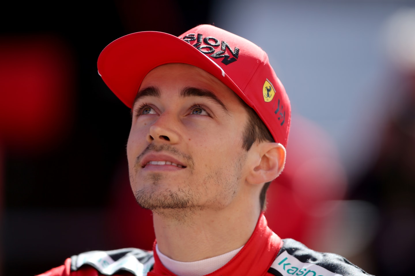BARCELONA, SPAIN - FEBRUARY 20: Charles Leclerc of Monaco and Ferrari looks on in the Pitlane