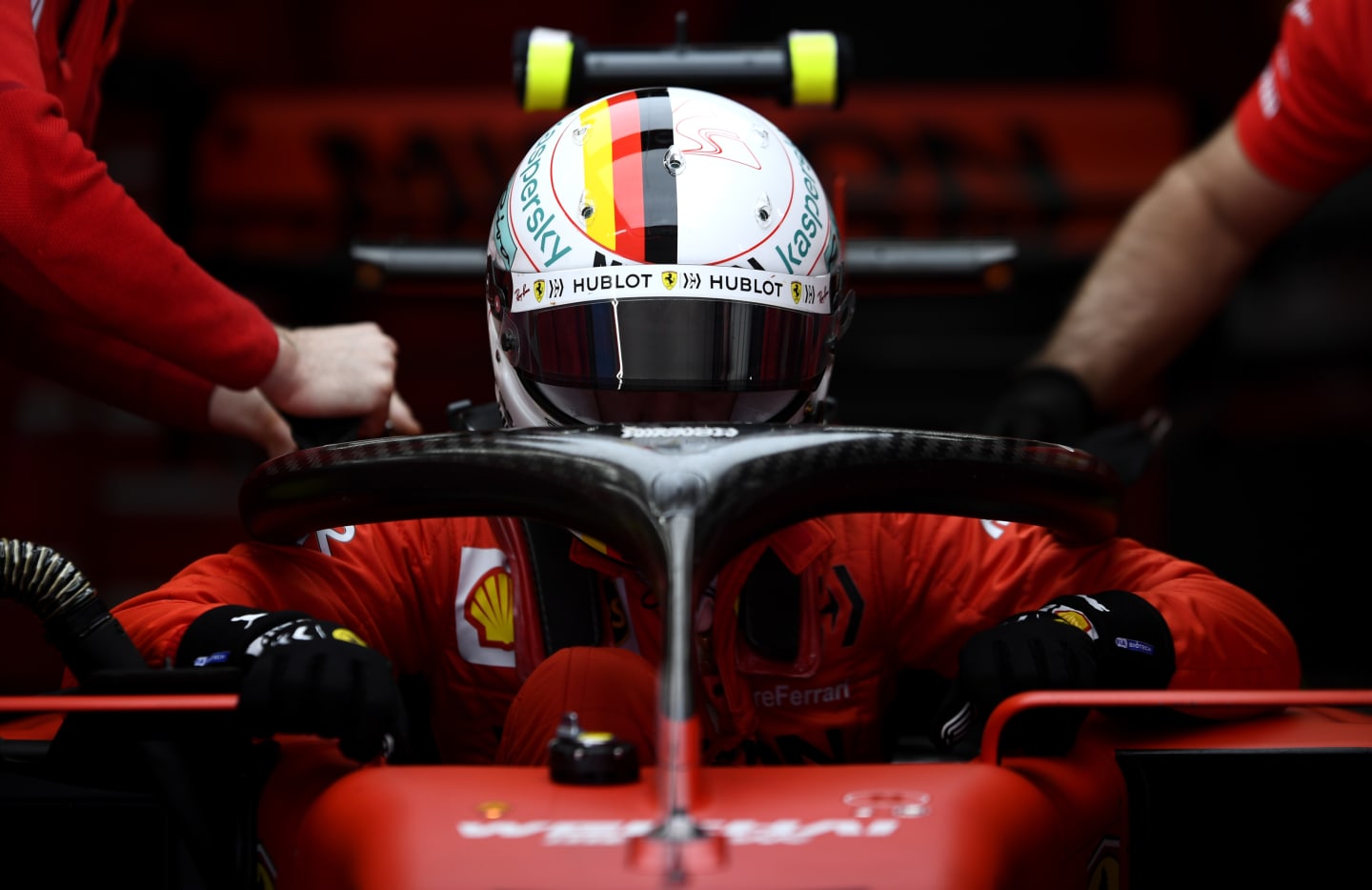 BARCELONA, SPAIN - FEBRUARY 27: Sebastian Vettel of Germany and Ferrari prepares to drive in the
