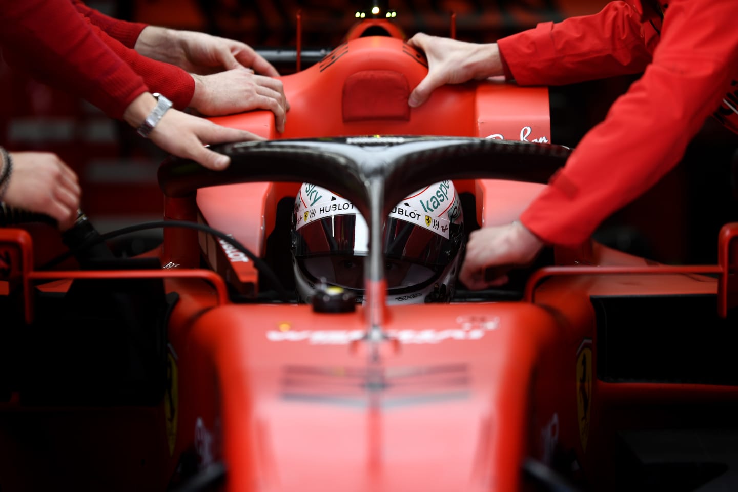 BARCELONA, SPAIN - FEBRUARY 27: Sebastian Vettel of Germany and Ferrari prepares to drive in the