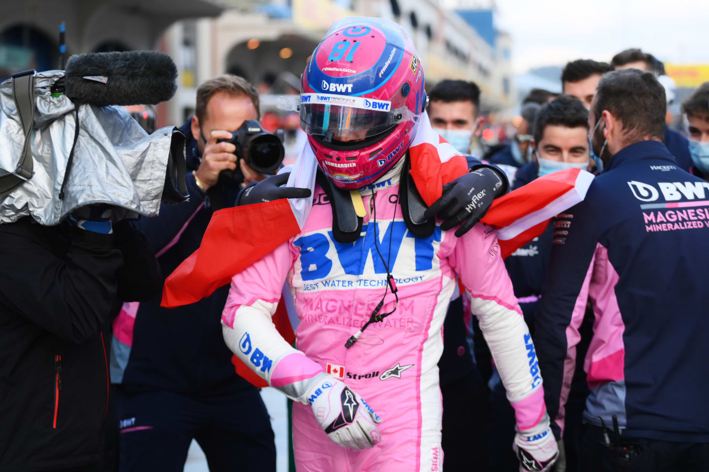 ISTANBUL, TURKEY - NOVEMBER 14: Pole position qualifier Lance Stroll of Canada and Racing Point celebrates with team members in parc ferme during qualifying ahead of the F1 Grand Prix of Turkey at Intercity Istanbul Park on November 14, 2020 in Istanbul, Turkey. (Photo by Clive Mason/Getty Images)