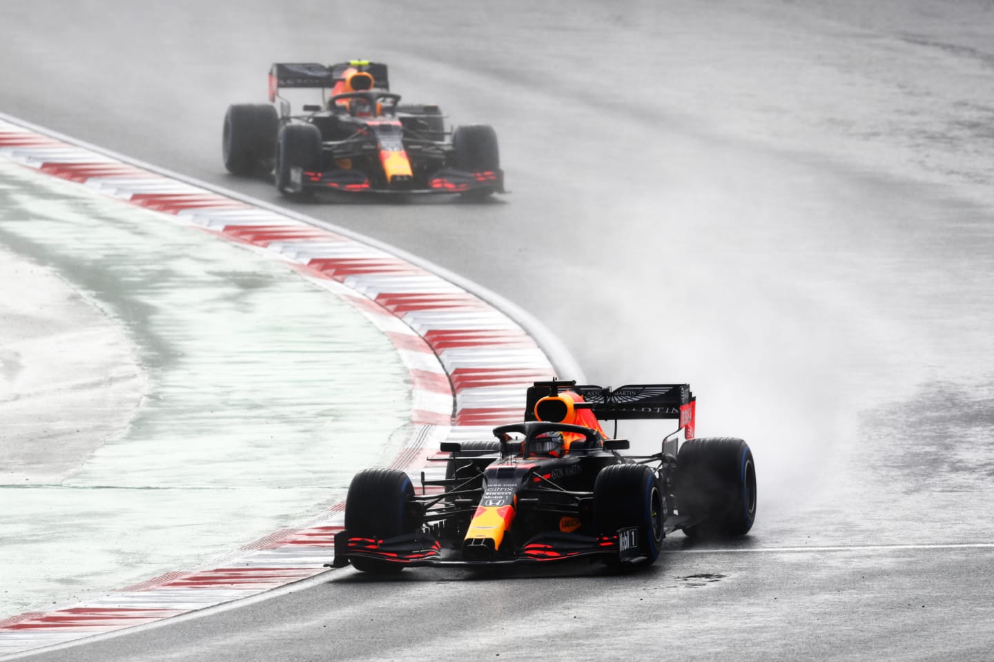 ISTANBUL, TURKEY - NOVEMBER 15: Max Verstappen of the Netherlands driving the (33) Aston Martin Red Bull Racing RB16 leads Alexander Albon of Thailand driving the (23) Aston Martin Red Bull Racing RB16 during the F1 Grand Prix of Turkey at Intercity Istanbul Park on November 15, 2020 in Istanbul, Turkey. (Photo by Clive Mason/Getty Images)