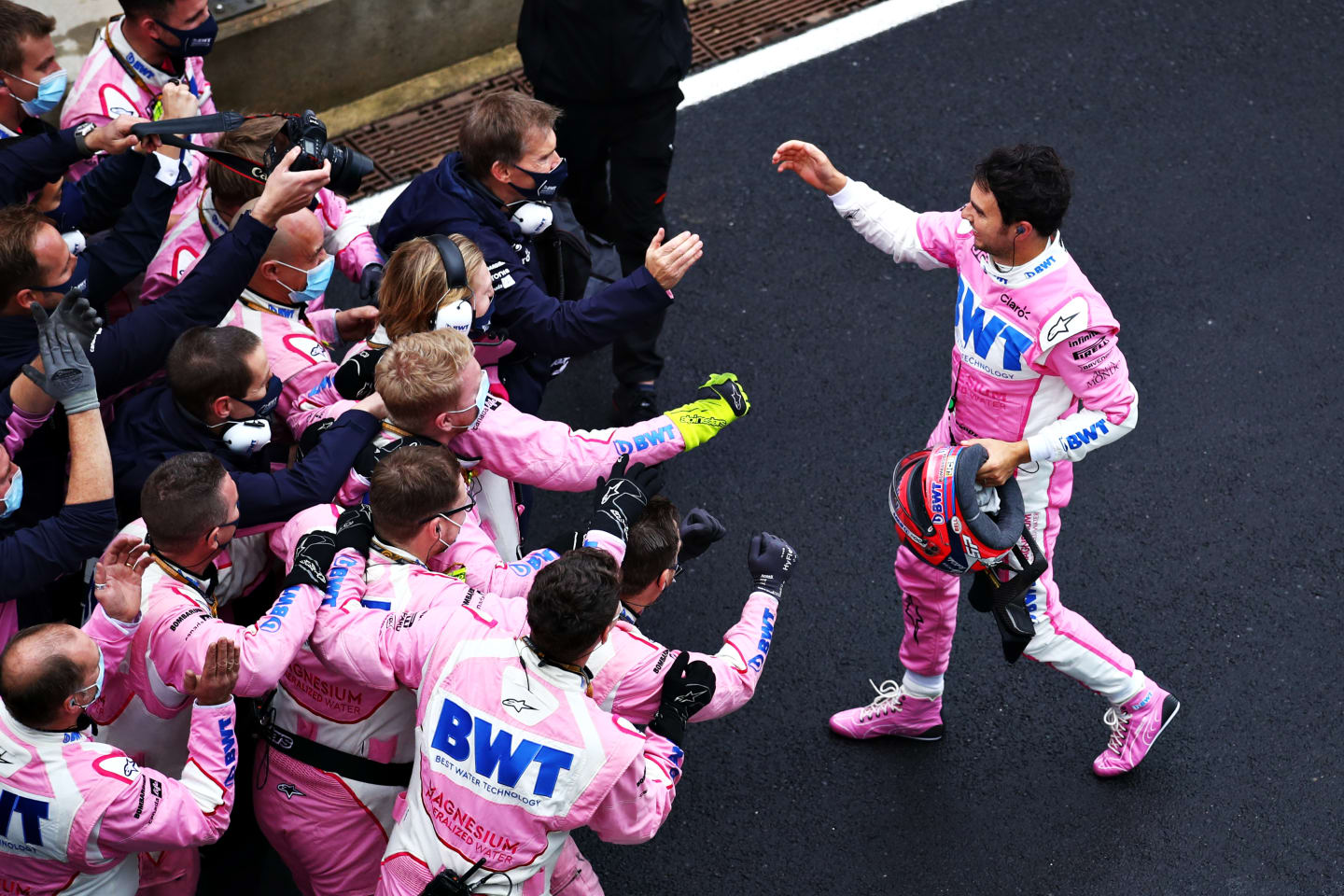 ISTANBUL, TURKEY - NOVEMBER 15: Second placed Sergio Perez of Mexico and Racing Point celebrates with his team in parc ferme during the F1 Grand Prix of Turkey at Intercity Istanbul Park on November 15, 2020 in Istanbul, Turkey. (Photo by Bryn Lennon/Getty Images)