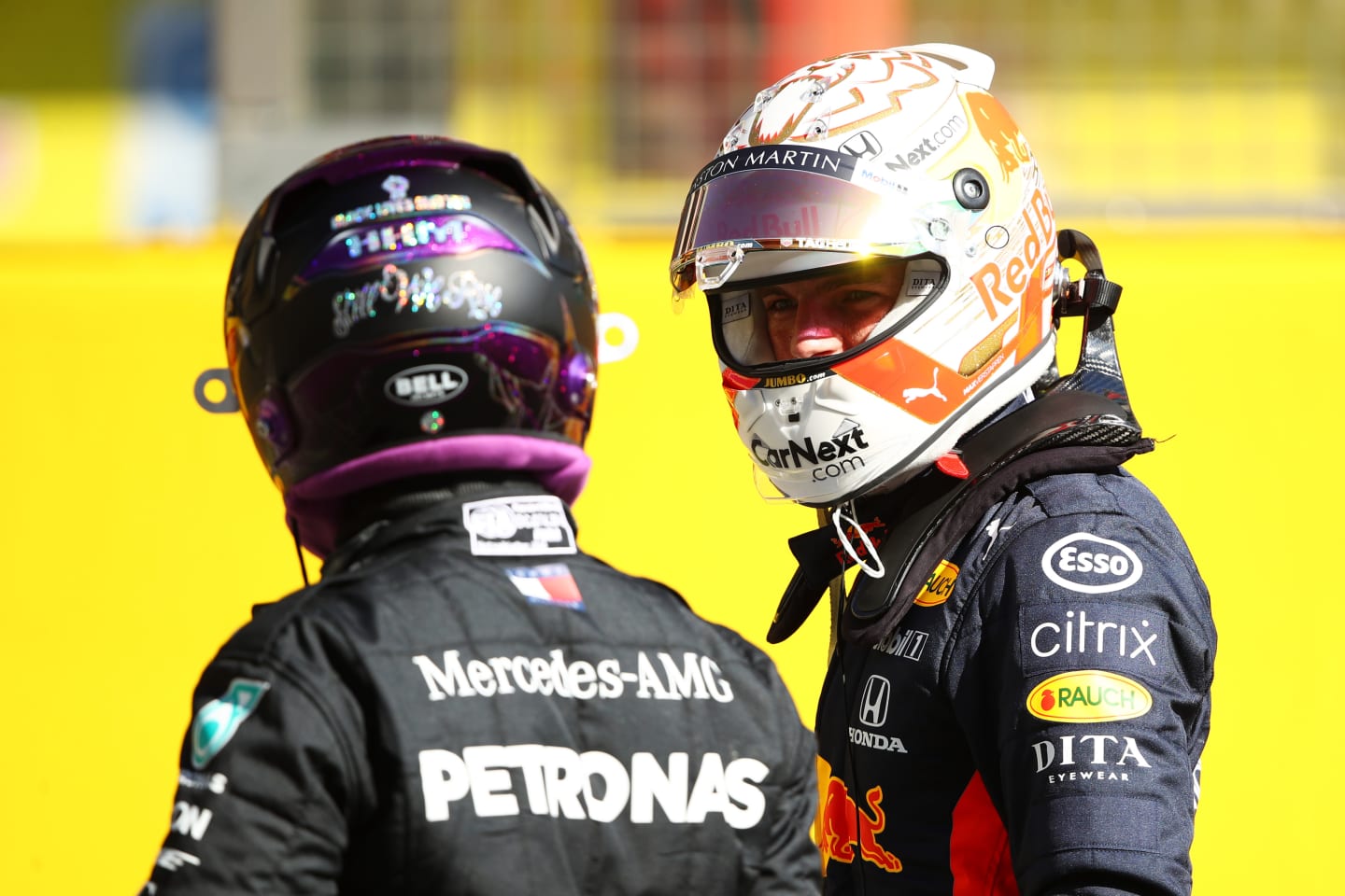 SCARPERIA, ITALY - SEPTEMBER 12: Pole position qualifier Lewis Hamilton of Great Britain and Mercedes GP and third placed qualifier Max Verstappen of Netherlands and Red Bull Racing talk in parc ferme during qualifying for the F1 Grand Prix of Tuscany at Mugello Circuit on September 12, 2020 in Scarperia, Italy. (Photo by Bryn Lennon/Getty Images)