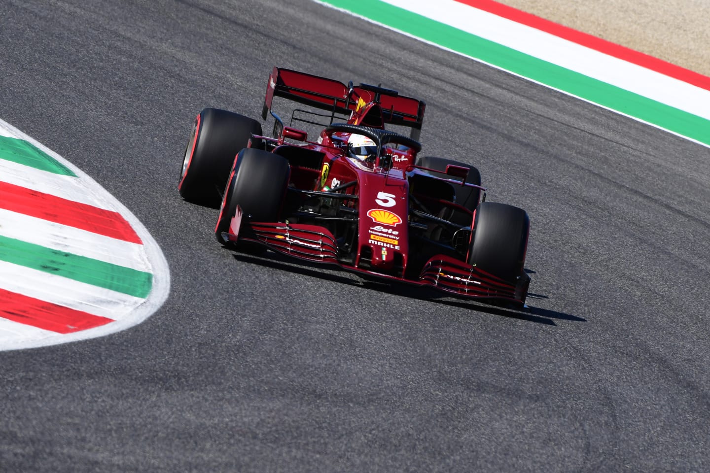 SCARPERIA, ITALY - SEPTEMBER 12: Sebastian Vettel of Germany driving the (5) Scuderia Ferrari