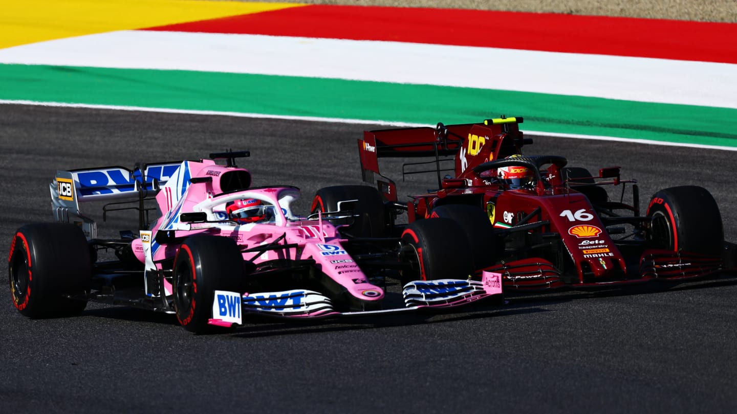 SCARPERIA, ITALY - SEPTEMBER 13: Charles Leclerc of Monaco driving the (16) Scuderia Ferrari SF1000 and Sergio Perez of Mexico driving the (11) Racing Point RP20 Mercedes battle for position during the F1 Grand Prix of Tuscany at Mugello Circuit on September 13, 2020 in Scarperia, Italy. (Photo by Dan Istitene - Formula 1/Formula 1 via Getty Images)