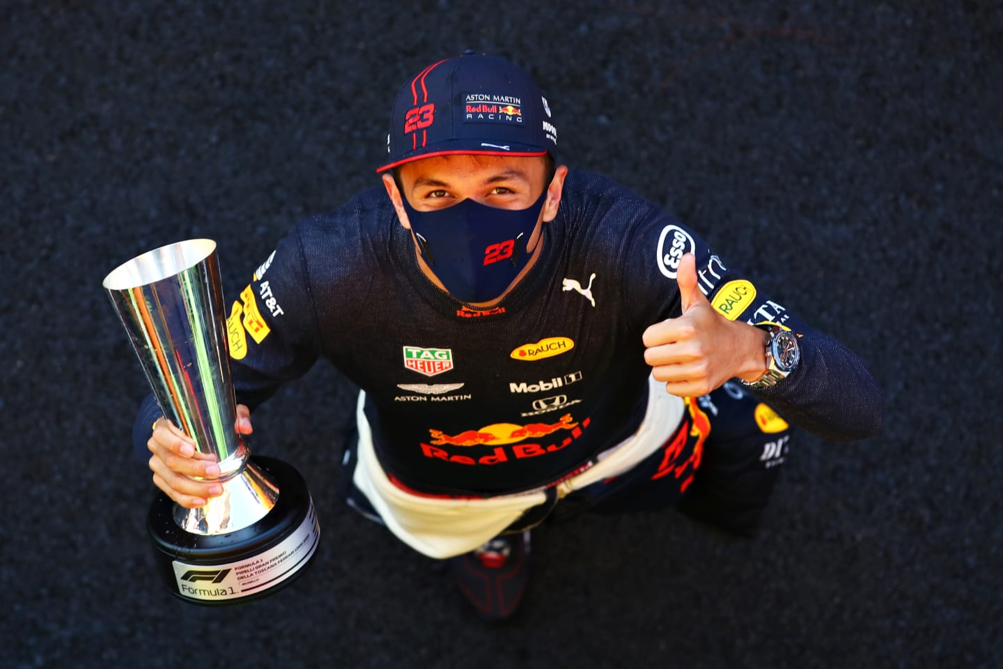 SCARPERIA, ITALY - SEPTEMBER 13: Third placed Alexander Albon of Thailand and Red Bull Racing celebrates after the F1 Grand Prix of Tuscany at Mugello Circuit on September 13, 2020 in Scarperia, Italy. (Photo by Mark Thompson/Getty Images)
