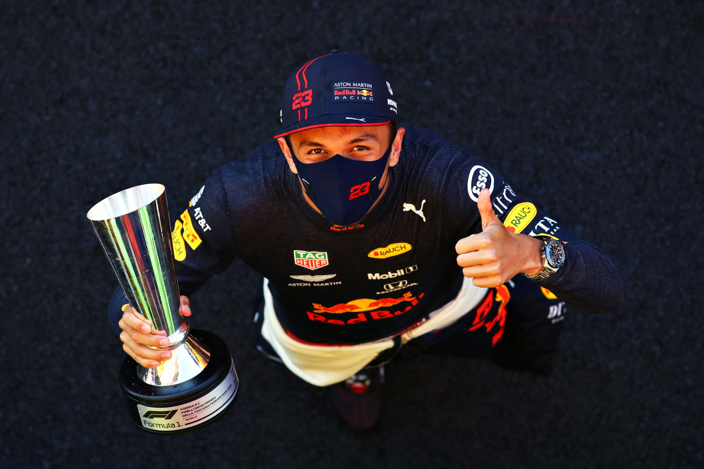 SCARPERIA, ITALY - SEPTEMBER 13: Third placed Alexander Albon of Thailand and Red Bull Racing celebrates after the F1 Grand Prix of Tuscany at Mugello Circuit on September 13, 2020 in Scarperia, Italy. (Photo by Mark Thompson/Getty Images)