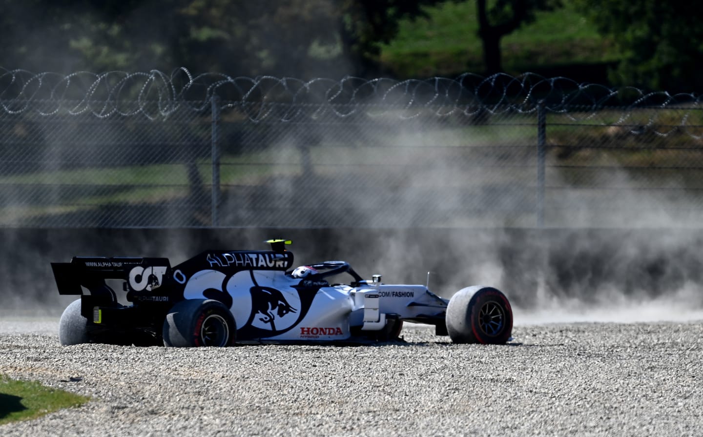 SCARPERIA, ITALY - SEPTEMBER 13: Pierre Gasly of France driving the (10) Scuderia AlphaTauri AT01 Honda stops in the gravel after a crash at the start during the F1 Grand Prix of Tuscany at Mugello Circuit on September 13, 2020 in Scarperia, Italy. (Photo by Clive Mason - Formula 1/Formula 1 via Getty Images)