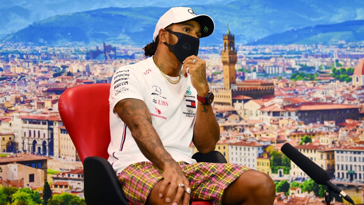 SCARPERIA, ITALY - SEPTEMBER 10: Lewis Hamilton of Great Britain and Mercedes GP talks in the