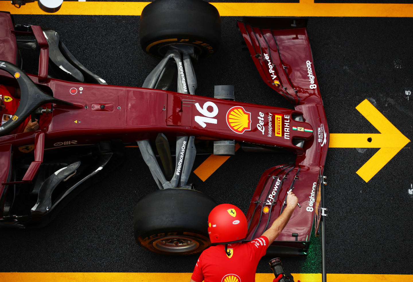 SCARPERIA, ITALY - SEPTEMBER 10: The Ferrari team practice pitstops during previews ahead of the F1