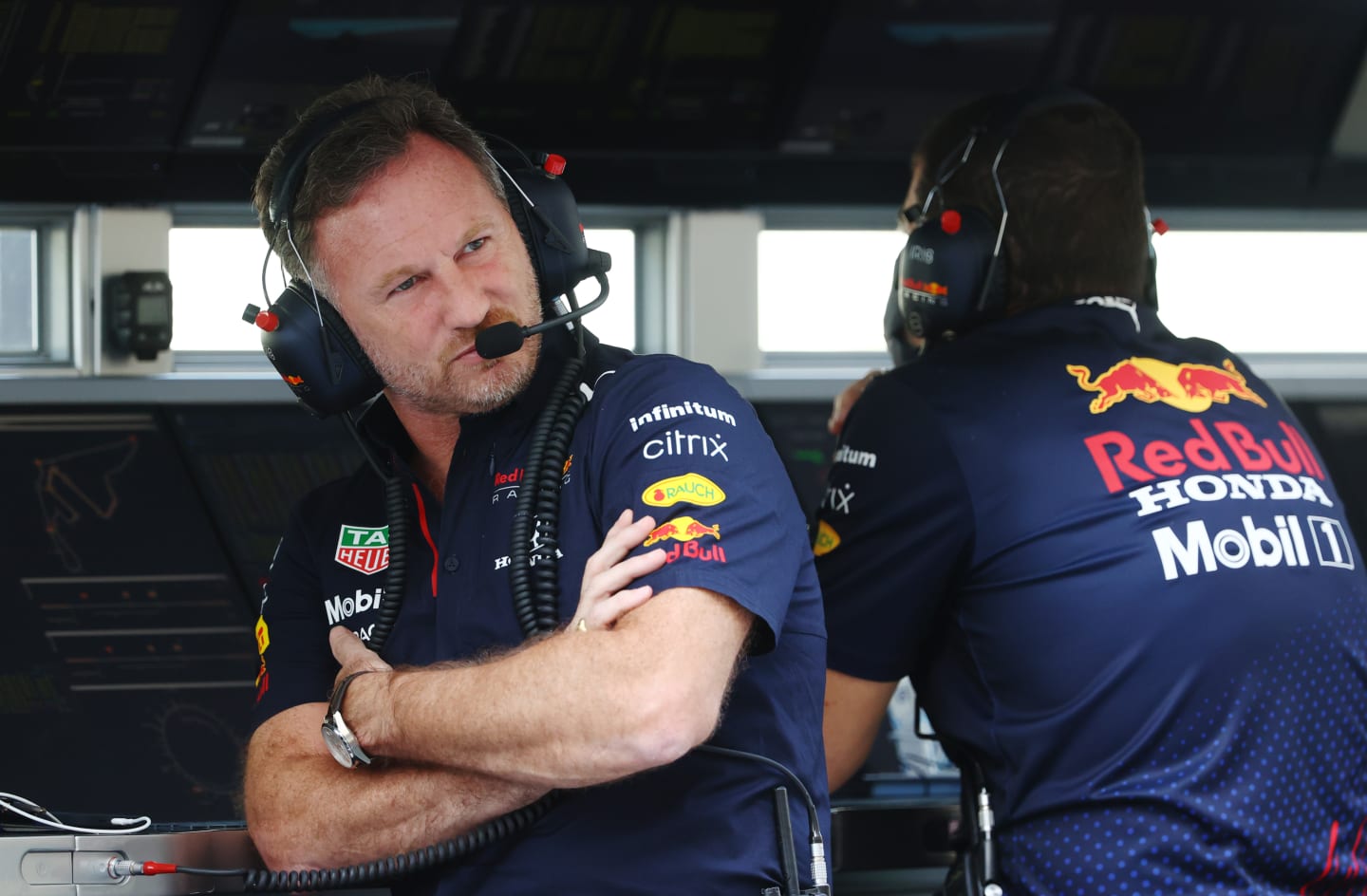 ABU DHABI, UNITED ARAB EMIRATES - DECEMBER 10: Red Bull Racing Team Principal Christian Horner looks on from the pitwall during practice ahead of the F1 Grand Prix of Abu Dhabi at Yas Marina Circuit on December 10, 2021 in Abu Dhabi, United Arab Emirates. (Photo by Clive Rose/Getty Images)