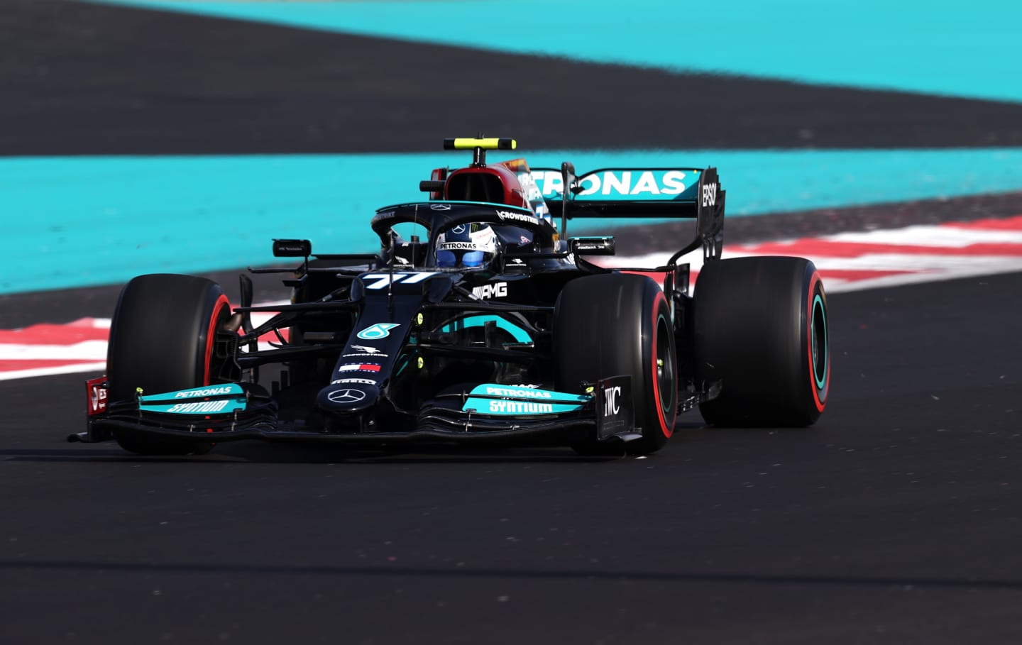 ABU DHABI, UNITED ARAB EMIRATES - DECEMBER 10: Valtteri Bottas of Finland driving the (77) Mercedes AMG Petronas F1 Team Mercedes W12 during practice ahead of the F1 Grand Prix of Abu Dhabi at Yas Marina Circuit on December 10, 2021 in Abu Dhabi, United Arab Emirates. (Photo by Lars Baron/Getty Images)