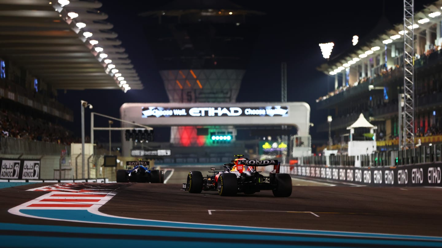 ABU DHABI, UNITED ARAB EMIRATES - DECEMBER 10:Sergio Perez of Mexico driving the (11) Red Bull