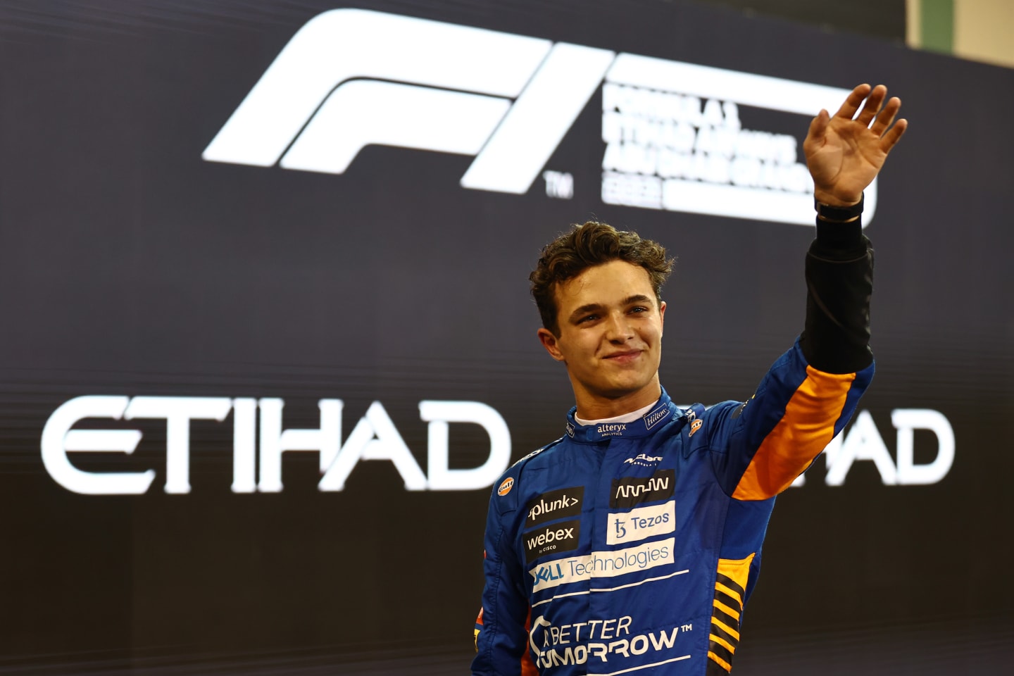ABU DHABI, UNITED ARAB EMIRATES - DECEMBER 11: Third place qualifier Lando Norris of Great Britain and McLaren F1 celebrates in parc ferme during qualifying ahead of the F1 Grand Prix of Abu Dhabi at Yas Marina Circuit on December 11, 2021 in Abu Dhabi, United Arab Emirates. (Photo by Mark Thompson/Getty Images)