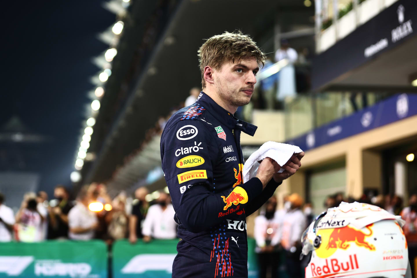 ABU DHABI, UNITED ARAB EMIRATES - DECEMBER 11: Pole position qualifier Max Verstappen of Netherlands and Red Bull Racing looks on in parc ferme  during qualifying ahead of the F1 Grand Prix of Abu Dhabi at Yas Marina Circuit on December 11, 2021 in Abu Dhabi, United Arab Emirates. (Photo by Mark Thompson/Getty Images)