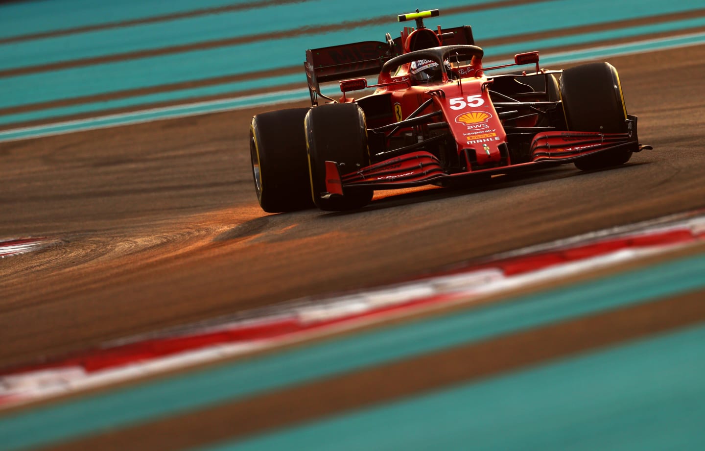 ABU DHABI, UNITED ARAB EMIRATES - DECEMBER 11: Carlos Sainz of Spain driving the (55) Scuderia Ferrari SF21 during qualifying ahead of the F1 Grand Prix of Abu Dhabi at Yas Marina Circuit on December 11, 2021 in Abu Dhabi, United Arab Emirates. (Photo by Clive Rose/Getty Images)
