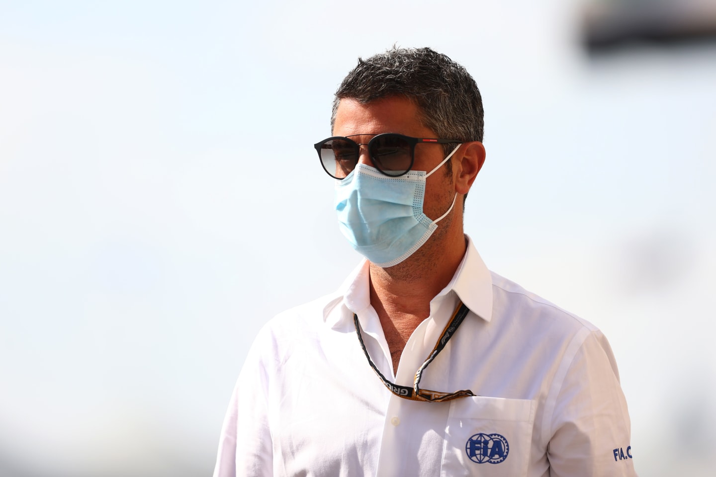 ABU DHABI, UNITED ARAB EMIRATES - DECEMBER 12: FIA Race Director Michael Masi walks in the Paddock