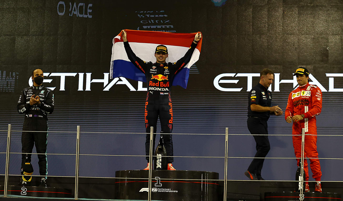 ABU DHABI, UNITED ARAB EMIRATES - DECEMBER 12: Race winner and 2021 F1 World Drivers Champion Max
