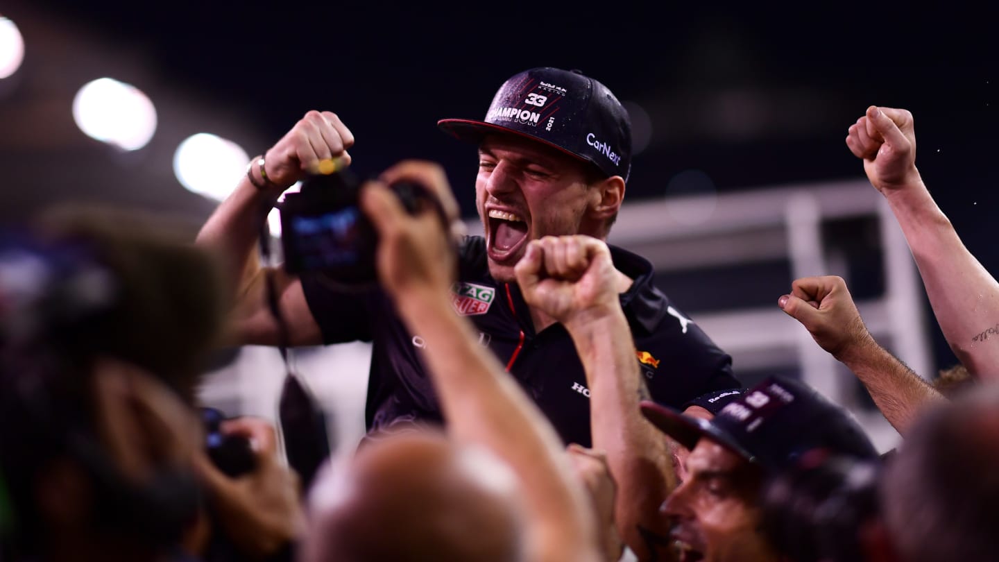 ABU DHABI, UNITED ARAB EMIRATES - DECEMBER 12: Race winner and 2021 F1 World Drivers Champion Max