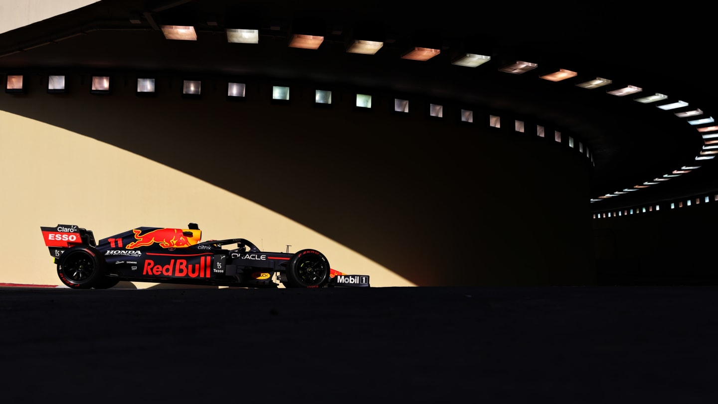 ABU DHABI, UNITED ARAB EMIRATES - DECEMBER 15: Sergio Perez of Mexico driving the (11) Red Bull