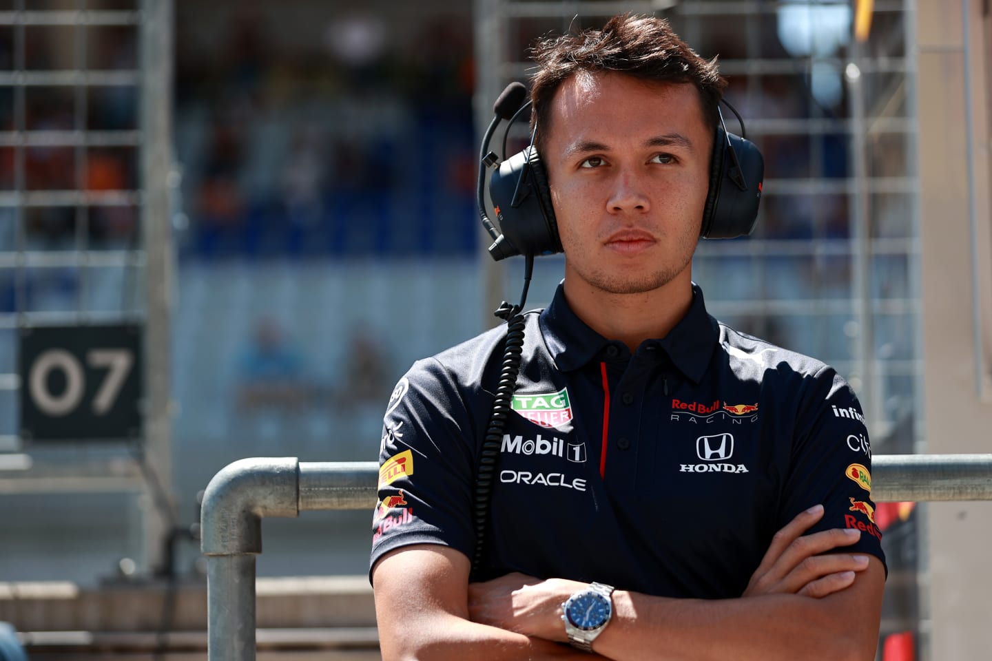 SPIELBERG, AUSTRIA - JULY 03: Alexander Albon of Thailand and Red Bull Racing looks on from the