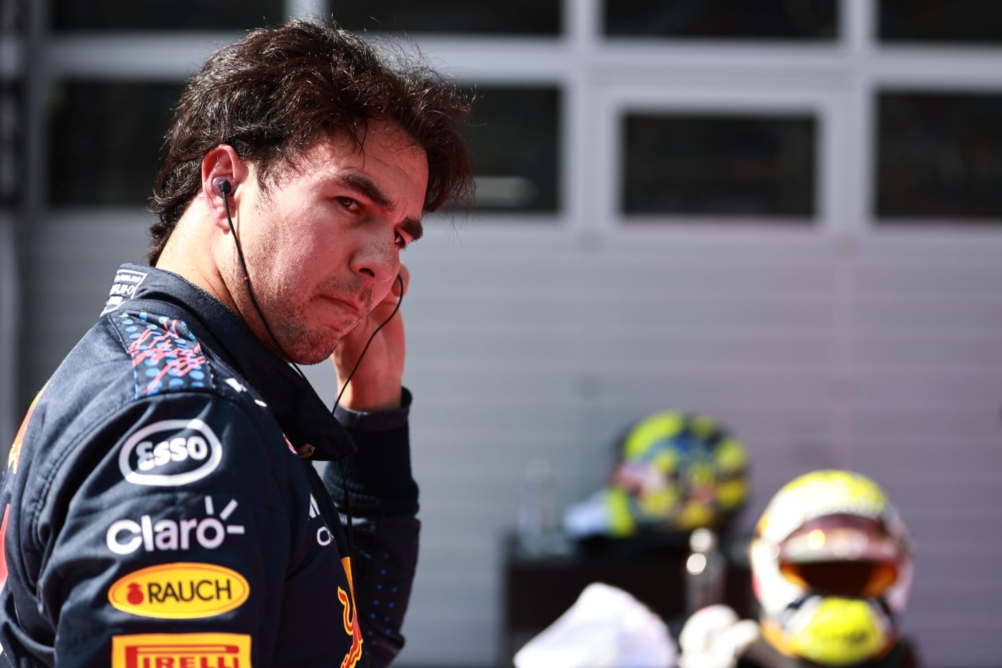 SPIELBERG, AUSTRIA - JULY 03: Third place qualifier Sergio Perez of Mexico and Red Bull Racing