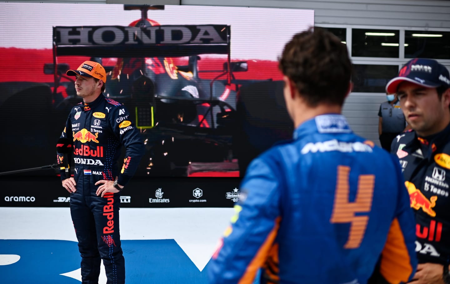 SPIELBERG, AUSTRIA - JULY 03: Pole position qualifier Max Verstappen of Netherlands and Red Bull Racing talks to the media in parc ferme during qualifying ahead of the F1 Grand Prix of Austria at Red Bull Ring on July 03, 2021 in Spielberg, Austria. (Photo by Christian Bruna - Pool/Getty Images)